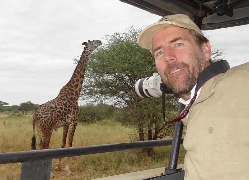 Dr.&nbsp;Derek Lee photographs a giraffe for identification in Tarangire National Park